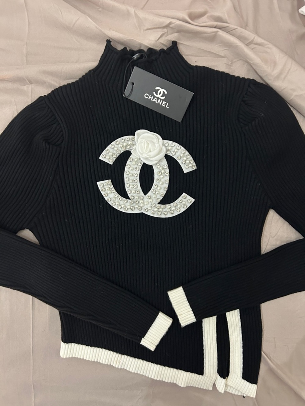 CHANEL Black Ribbed Knit Top with White Pearl CC Emblem - COPY